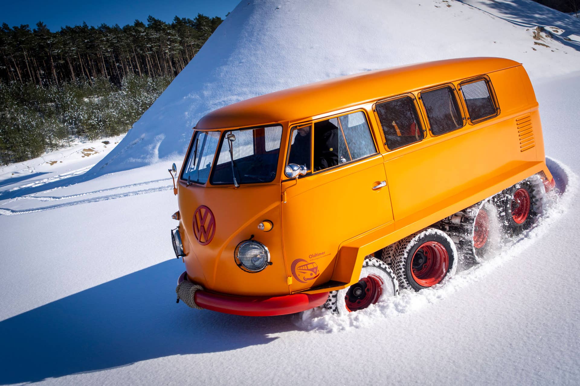 VW restores rare split-window Bus with tank-like tracks - Autoblog